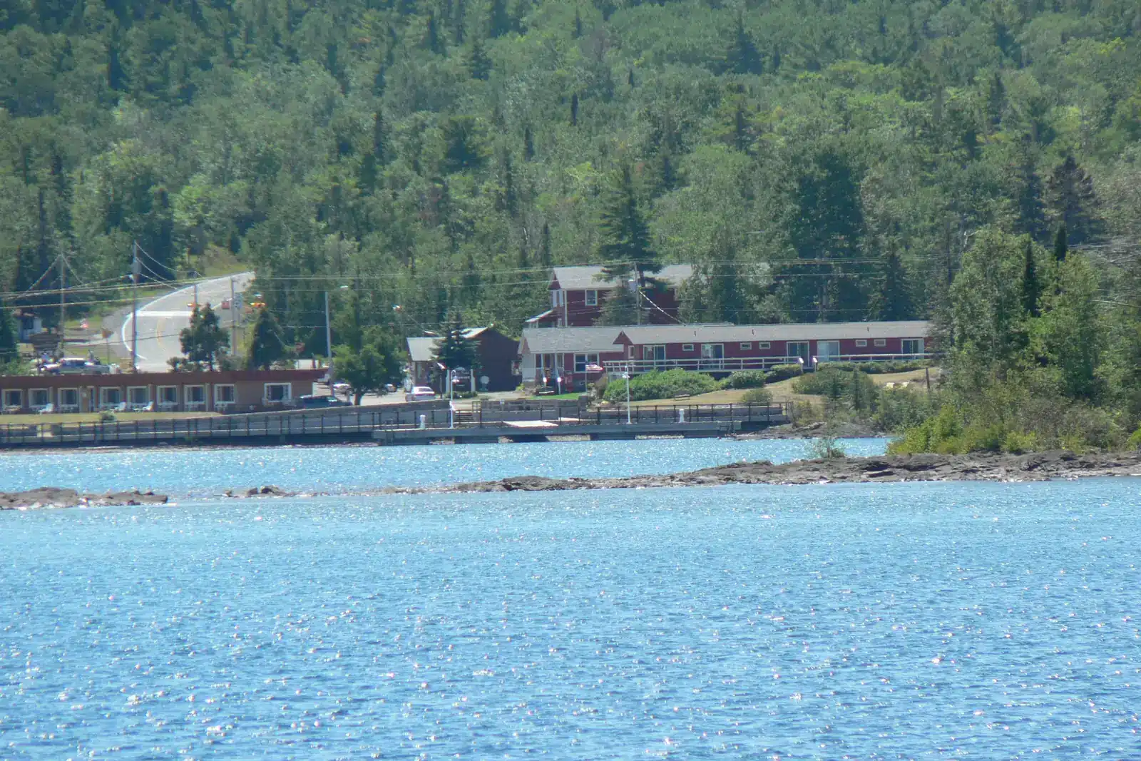 Docks and buildings along the Copper Harbor waterfront, seen from the water.